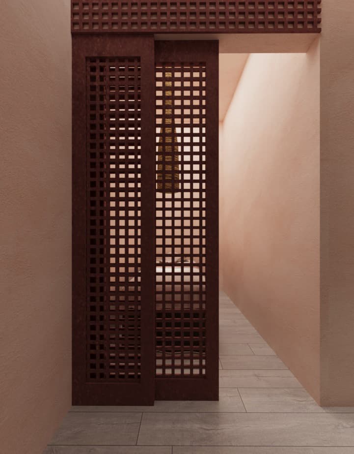 Oxblood lattice doors opening onto a warm plaster corridor